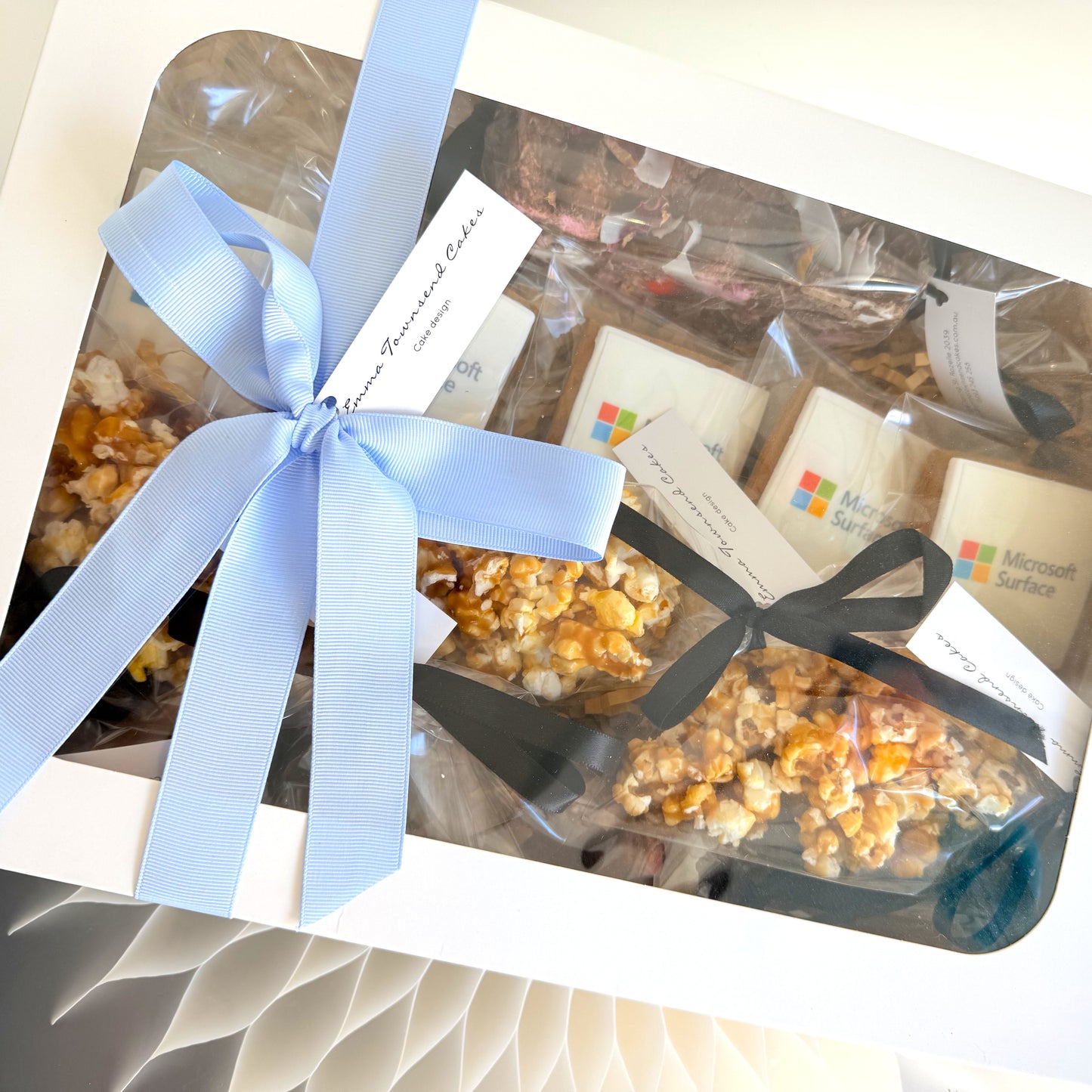Corporate Gift Hamper with branded logo cookies, caramel popcorn and rocky road, tied with ribbon