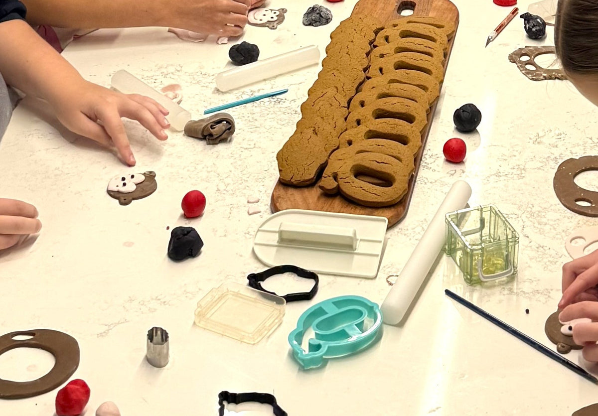 Gingerbread and fondant decorating at a kids cake decorating party